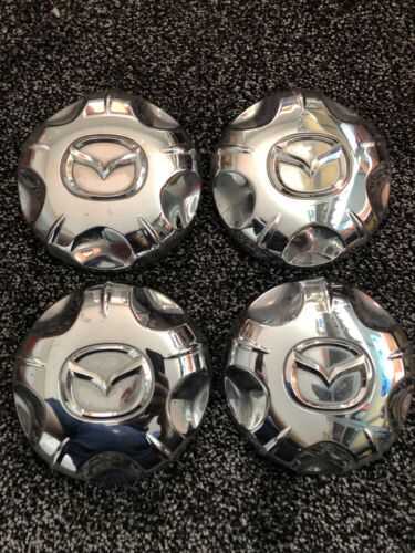 4x CHROME MAZDA TRIBUTE 2000 - 2007 WHEEL CENTRE HUB CAP